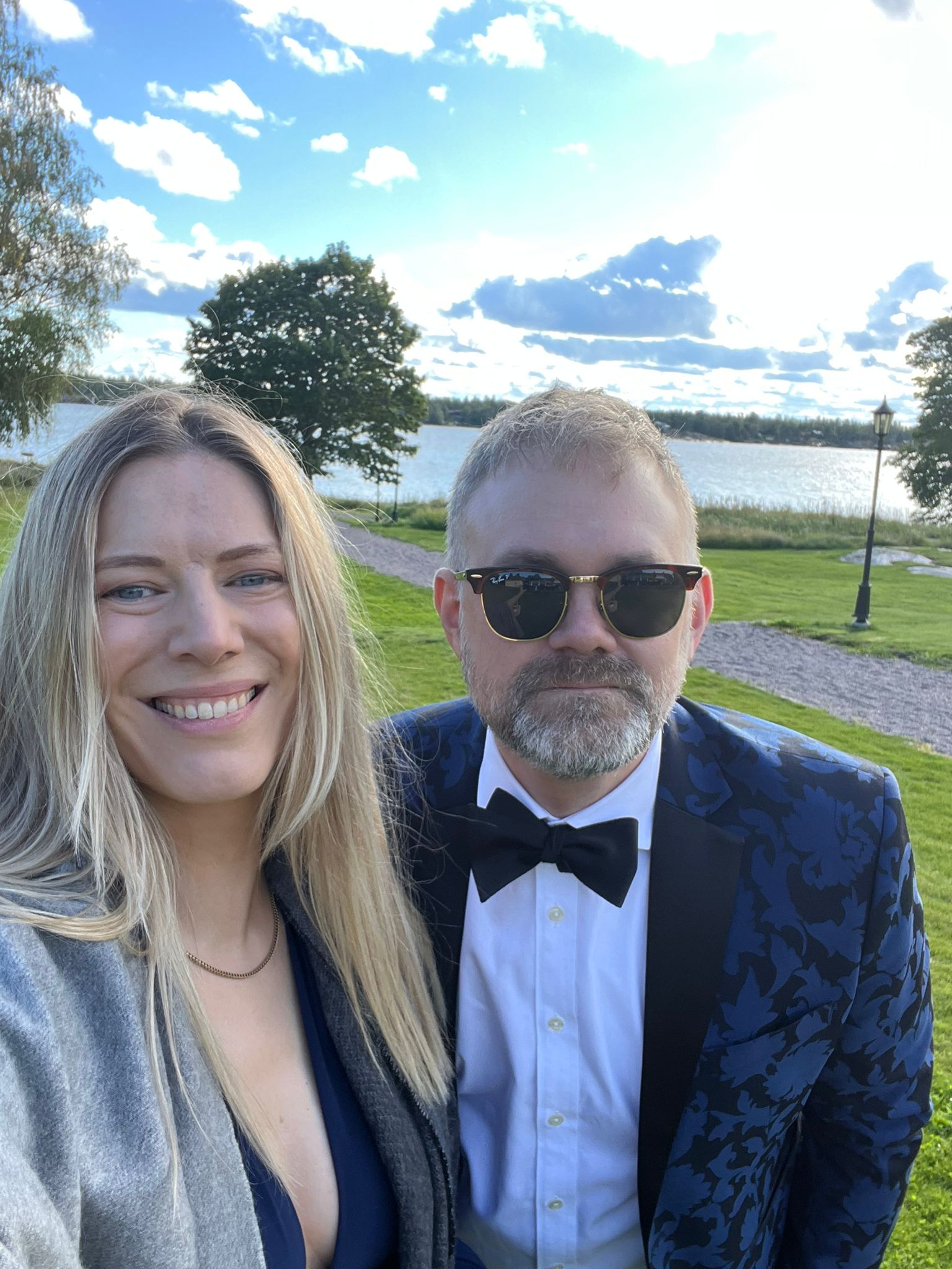 Sarah and Tommy together beside a lake